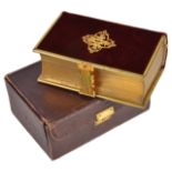 A red velvet and gilt metal border Common Prayer Book, the front with applied pierced initials, with