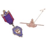 A 9ct gold military sweetheart pintogether with a silver gilt Order of the Odd Fellows jewell,