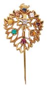 An eastern diamond and gem set hinged turban pin the pierced and shaped stylised foliate pin set