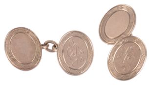 A pair of 9ct gold oval cufflinks bearing monogram E.J.Hmarked Birmingham 1950, chain linked and