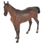 A cold painted bronze figure of a horse, in the style of Bergman