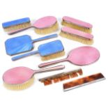 A suite of Mappin & Webb enamelled dressing table brushes and mirrorsa clothes and hair brush with