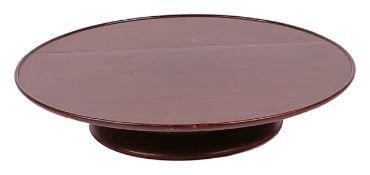 A late 19th century mahogany Lazy Susan with raised edge to rim