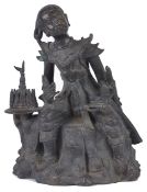 A large early 20th century Burmese bronze figure of a warrior seated upon a rock wearing sword to