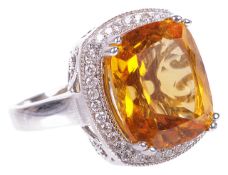 A large striking contemporary citrine and diamond set fancy ringthe central cushion cut citrine