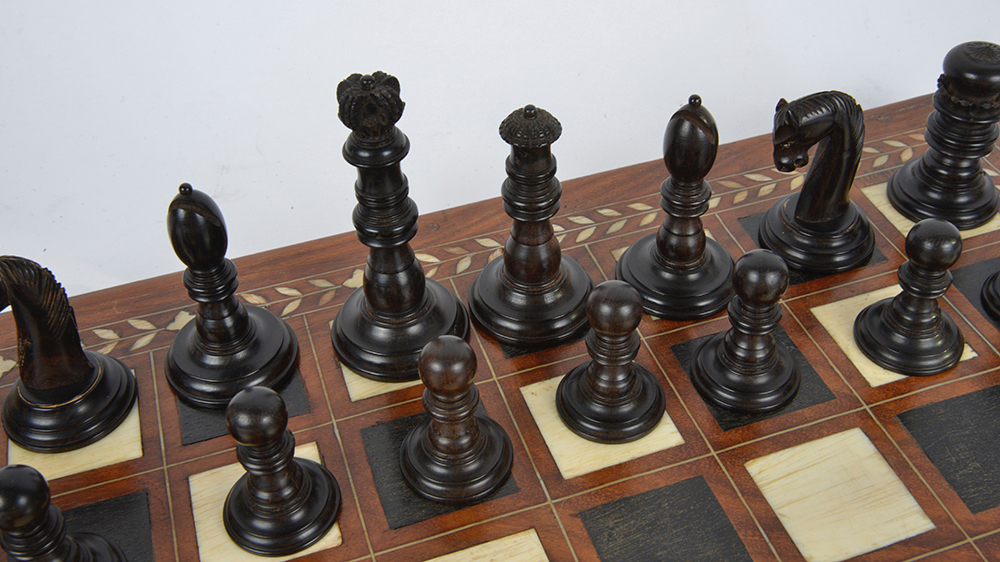 A late 19th/early 20th century coromandel and ivory chess set and later boardthe turned ivory and - Image 3 of 13