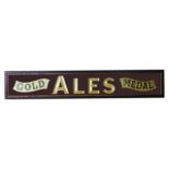 A contemporary pub sign ' Gold Medal Ales'