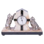 An Art Deco clockcentral clock in an alabaster and marble surround, flanked by two playful cats upon