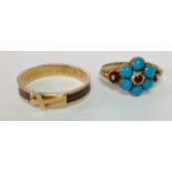A delicate early 19th century turquoise and ruby 'forget me not' cluster ring, having central