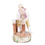 A Stevenson & Hancock, Derby porcleain figurine of a potter,early 20th Centuryrealistically