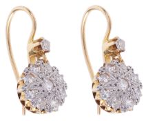 A pair of delicate Edwardian diamond set cluster drop earringsthe cluster drops suspended from the