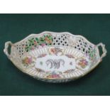 DRESDEN HANDPAINTED AND GILDED FLORAL DECORATED TWO HANDLED PIERCEWORK OVAL CERAMIC BASKET