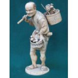 GOOD QUALITY HEAVILY CARVED SECTIONAL IVORY FIGURE DEPICTING AN ORIENTAL GENT, SIGNED TO BASE,