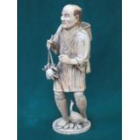 GOOD QUALITY HEAVILY CARVED SECTIONAL IVORY FIGURE DEPICTING AN ORIENTAL FISHERMAN, SIGNED TO BASE,