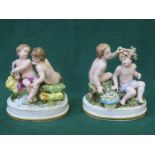 PAIR OF CONTINENTAL STYLE HANDPAINTED AND GILDED CERAMIC FIGURE GROUPS,