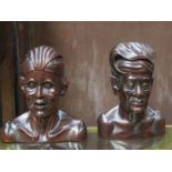 PAIR OF ORIENTAL STYLE CARVED TREEN BUSTS