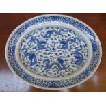 BLUE AND WHITE OVAL GLAZED CERAMIC ASHETTE DECORATED WITH CHINESE DRAGONS