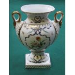 HANDPAINTED AND GILDED FLORAL DECORATED TWO HANDLED CERAMIC VASE,