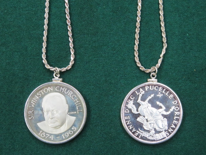 TWO COMMEMORATIVE COIN PENDANTS ON 925 SILVER CHAINS