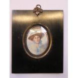 FRAMED MINIATURE PORTRAIT WITH GILDED AND EBONISED FRAME