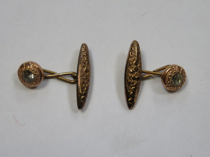 PAIR OF GOLD COLOURED CUFFLINKS SET WITH CLEAR STONES