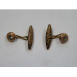 PAIR OF GOLD COLOURED CUFFLINKS SET WITH CLEAR STONES