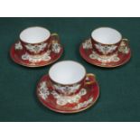 SET OF THREE ROYAL CROWN DERBY CUPS AND SAUCERS