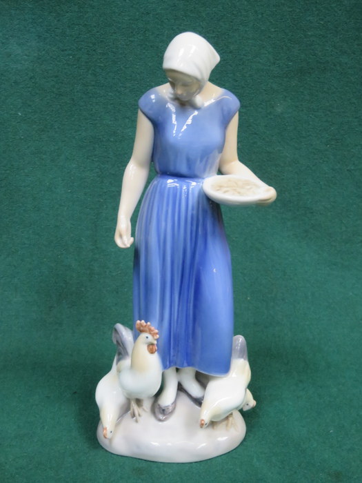 DANISH CERAMIC FIGURE IN THE STYLE OF ROYAL COPENHAGEN,