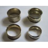 FOUR VARIOUS HALLMARKED SILVER NAPKIN RINGS