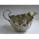 HALLMARKED SILVER REPOUSSE FLORAL DECORATED MILK JUG,