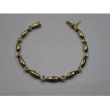 18ct GOLD BRACELET SET WITH CLEAR STONES