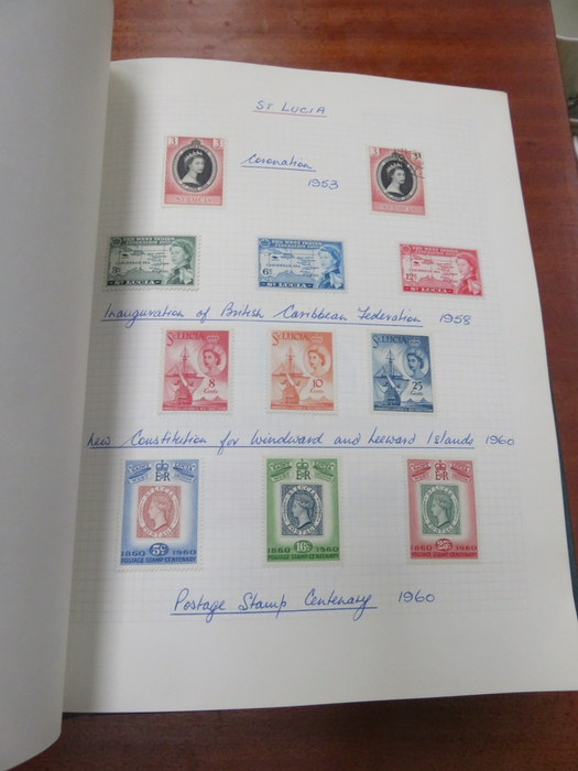 FOUR ALBUMS OF VARIOUS FOREIGN POSTAGE STAMPS