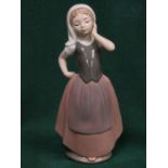 NAO GLAZED CERAMIC FIGURE,