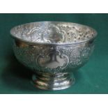 HALLMARKED SILVER REPOUSSE DECORATED PUNCH BOWL ON RAISED SUPPORTS,