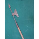 INTERESTING CAST IRON AND WOODEN HANDLED TRIBAL SPEAR