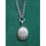 VICTORIAN SILVER OVAL LOCKET ON CHAIN