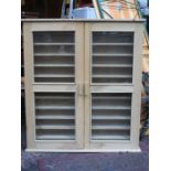 STRIPPED PINE TWO DOOR GLAZED DISPLAY CABINET