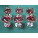 SET OF SIX GILDED AND CRANBERRY COLOURED DRINKING GLASSES