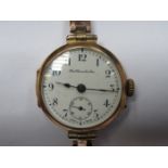 THOMAS RUSSELL & SON 9ct GOLD WRISTWATCH ON 9ct GOLD EXPANDABLE STRAP