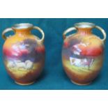 PAIR OF ROYAL DOULTON GILDED TWO HANDLED CERAMIC VASES DEPICTING HIGHLAND CATTLE AND SHEEP,