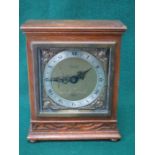 CARVED FRONTED ELLIOT CLOCK BY MORATH BROS,