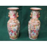 PAIR OF CANTONESE STYLE HANDPAINTED AND GILDED CERAMIC VASES DECORATED IN THE TYPICAL MANNER,