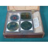 MAHOGANY BOX CONTAINING VARIOUS COLOURED GLASS LANTERN SLIDES PLUS OTHERS