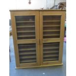 STRIPPED PINE TWO DOOR GLAZED DISPLAY CABINET