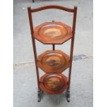 MAHOGANY THREE TIER CAKESTAND DECORATED WITH ORIENTAL SCENES