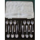 CASED SET OF TWELVE WALKER AND HALL SILVER PLATED TEASPOONS AND SUGAR TONGS