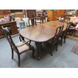 WARINGS MAHOGANY EXTENDING DINING TABLE WITH TWO LEAVES,