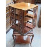 MAHOGANY PIERCEWORK DECORATED REVOLVING BOOKCASE