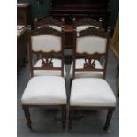 SET OF FOUR CARVED MAHOGANY UPHOLSTERED HIGH BACK DINING CHAIRS