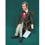 SEATED DOLL DEPICTING REX HARRISON AS DR DOLITTLE FROM THE 1960s FILM